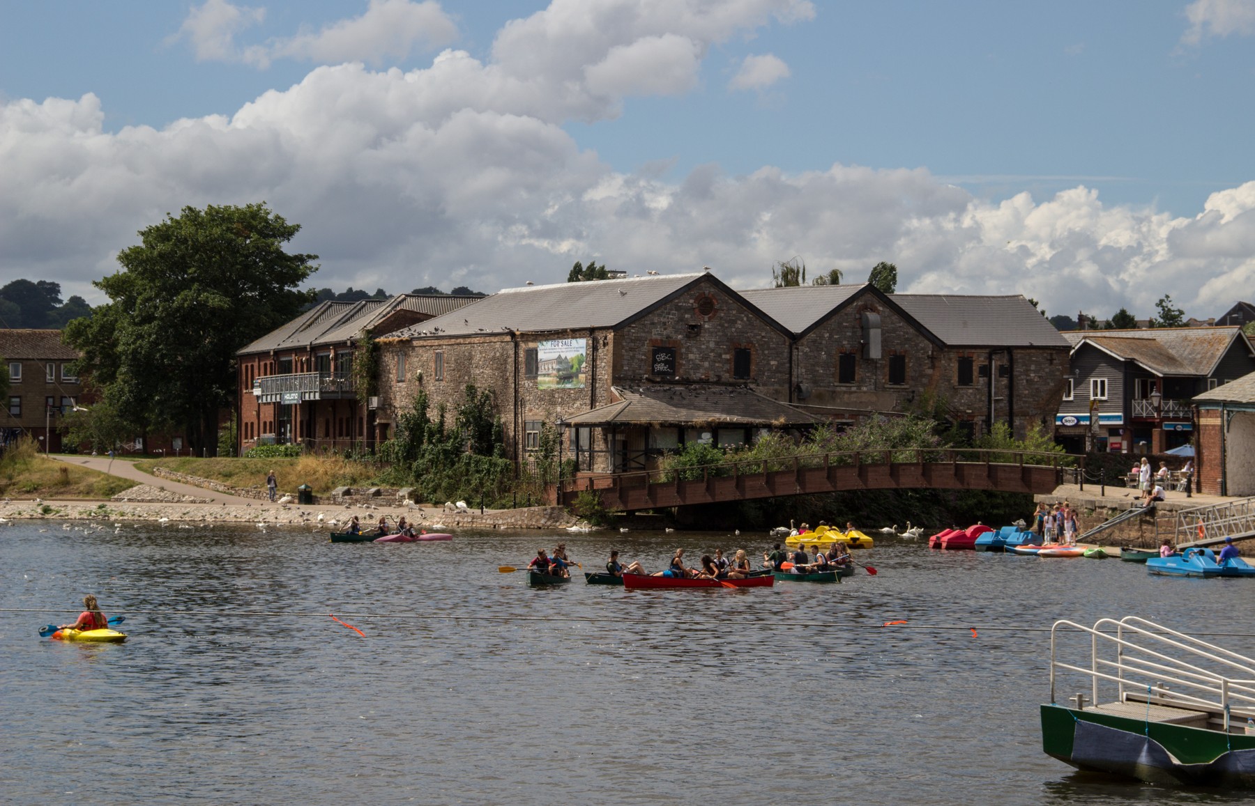 Boats on the River Exe beside the historic Exeter Quayside